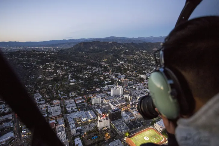 Private Doors-Off Aerial Photography Tour in R22 Helicopter