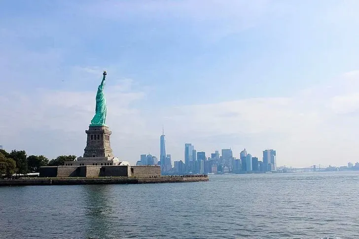 Statue of Liberty, Ellis Island & Empire State Building Cruise in Midtown